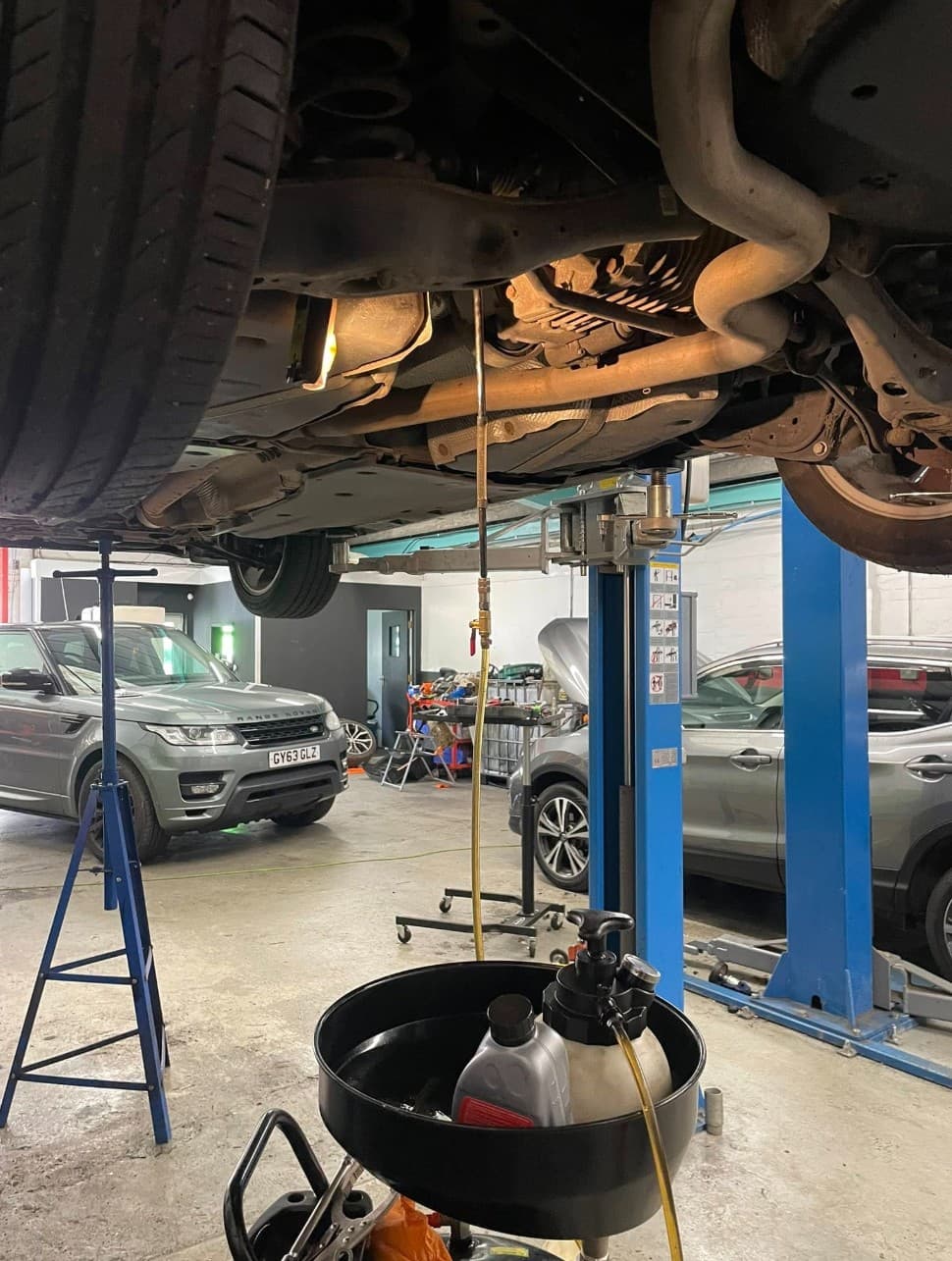 Mechanic working on a car